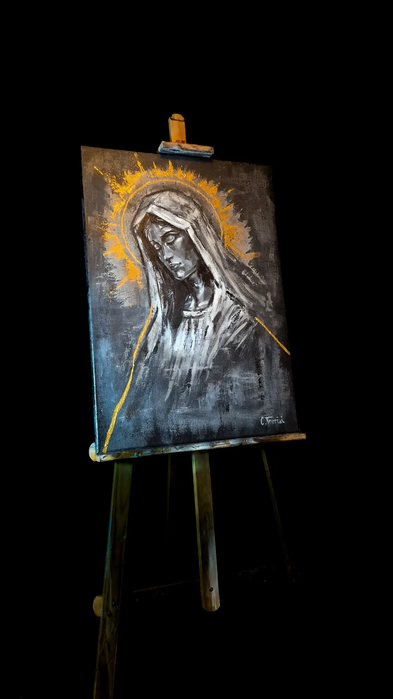 MATER DOLOROSA, 2026 — acrylic on canvas shown on an easel against black: a veiled figure beneath a gold-rayed halo